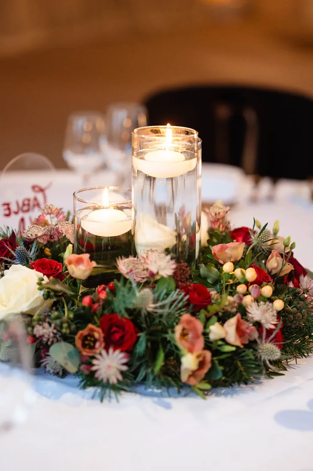 Winter wedding table centrepiece at Clock Barn