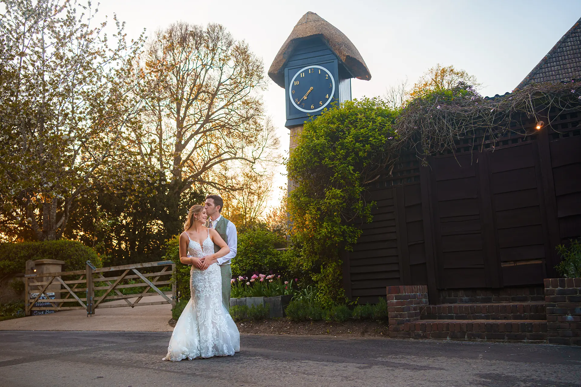 clock barn weddings couple entrance