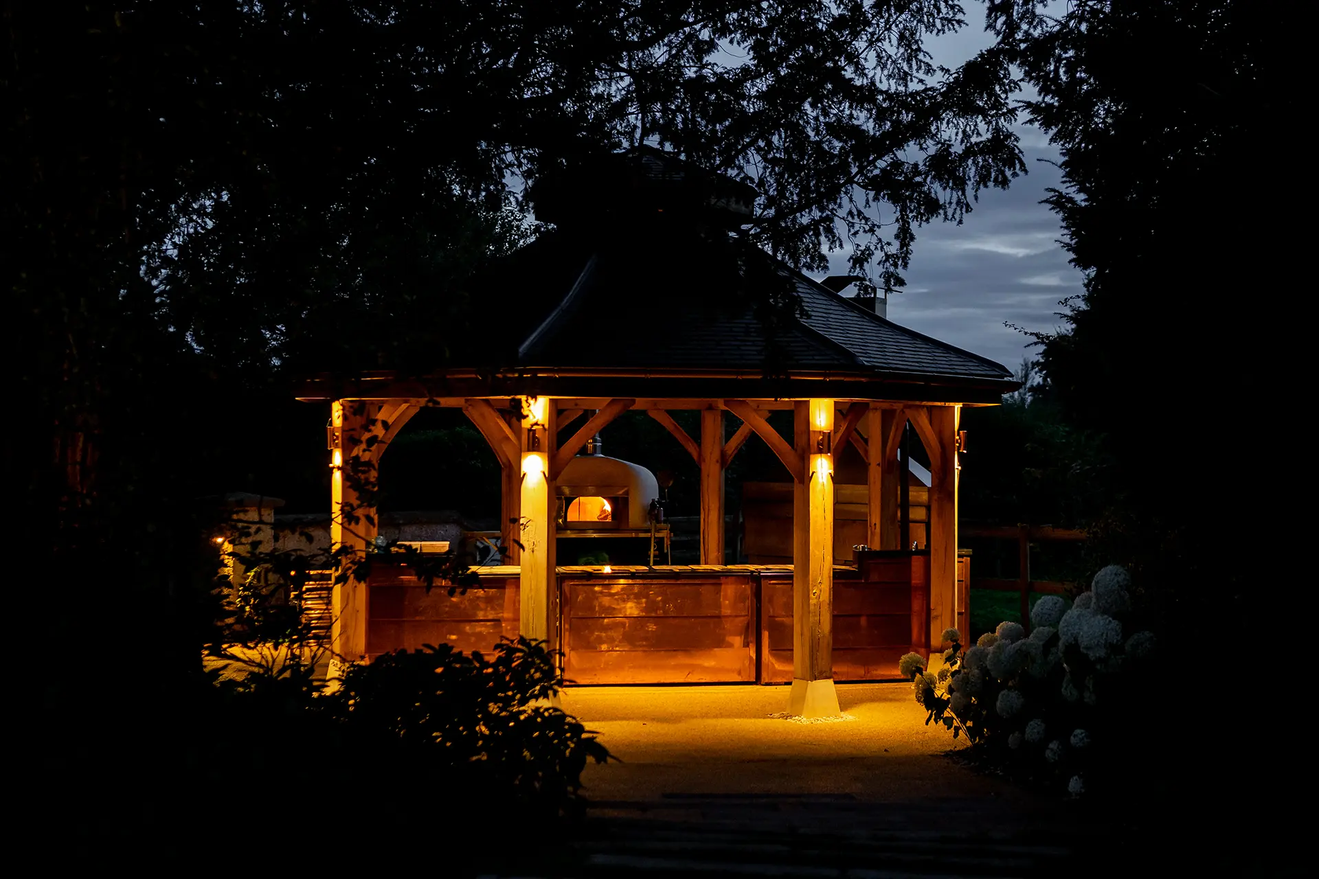 clock barn weddings outdoor kitchen evening